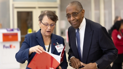 Dean Murtha and Dean Johnson talk at the integration summit.