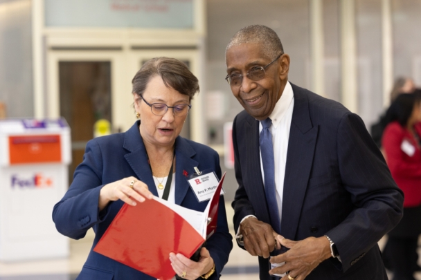 Dean Murtha and Dean Johnson talk at the integration summit.